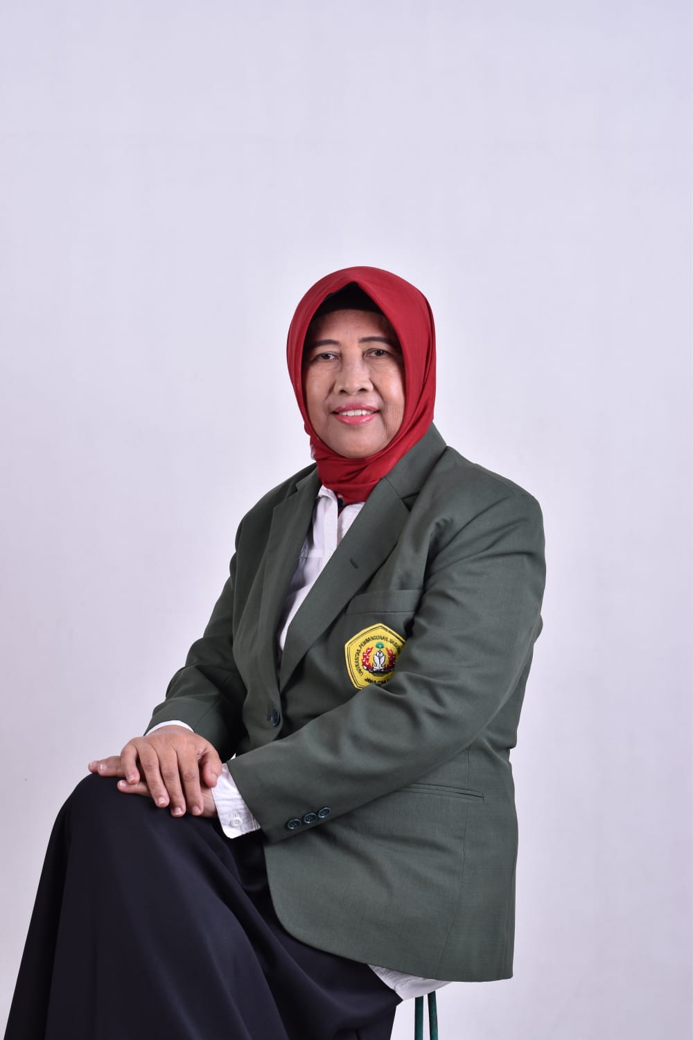 Prof. Dr. Dra. Jariyah, MP